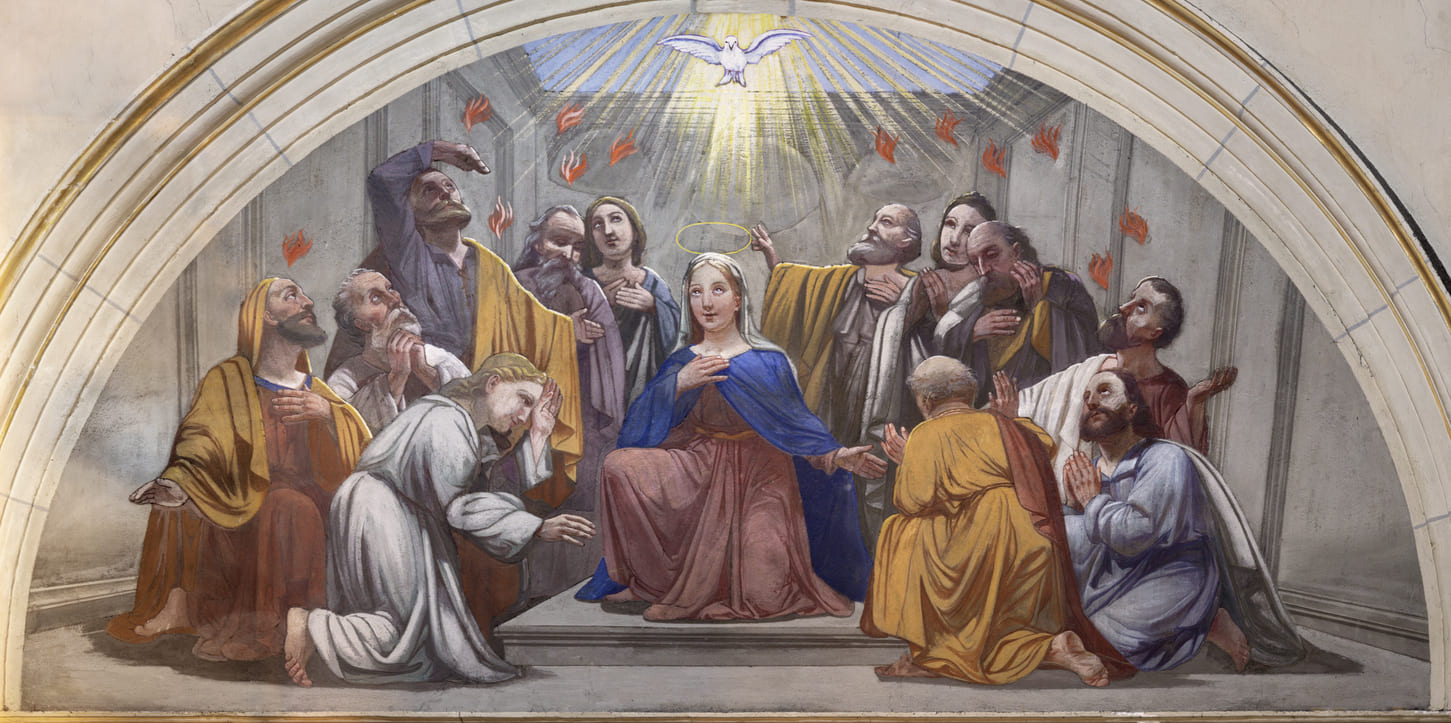 A mural depicting Pentecost, where the Holy Spirit descends as tongues of fire on Mary and the apostles.