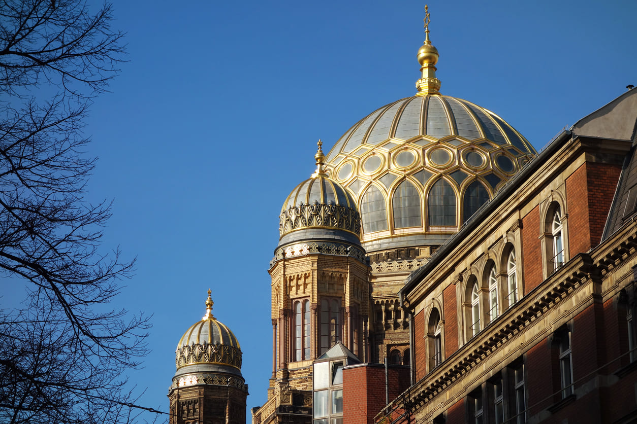 Golden dome of Berlin's New Synagogue, a symbol of remembrance and resilience in German history.