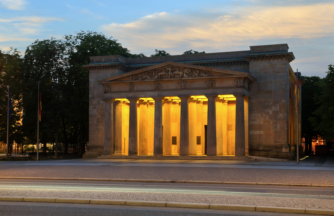 The illuminated Neue Wache in Berlin, a solemn memorial dedicated to the victims of war and tyranny.