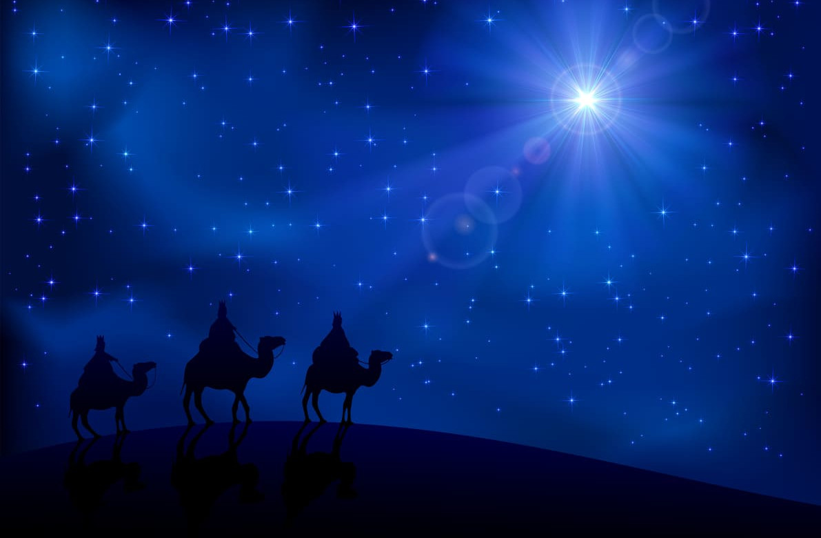 Silhouettes of the Three Wise Men on camels follow the radiant Star of Bethlehem across a starry night sky.