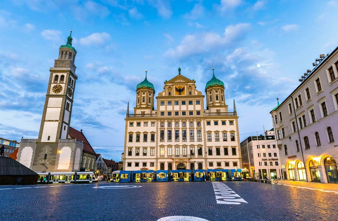 Augsburg Town Hall and Perlach Tower, iconic landmarks that symbolize the city's rich history and its celebration of the Peace Festival.