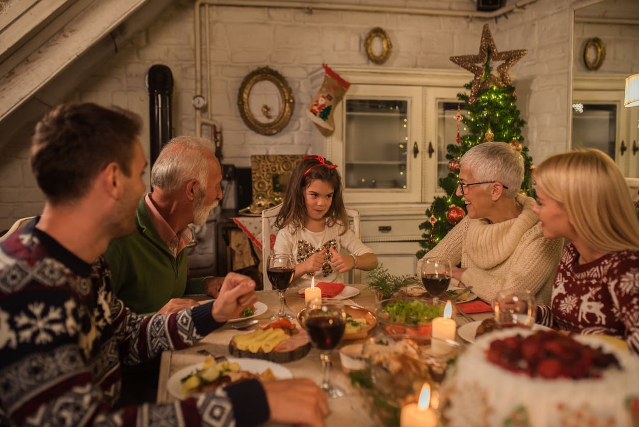 A family gathers around a festive table, sharing a warm meal and celebrating the joy of Second Christmas Day.