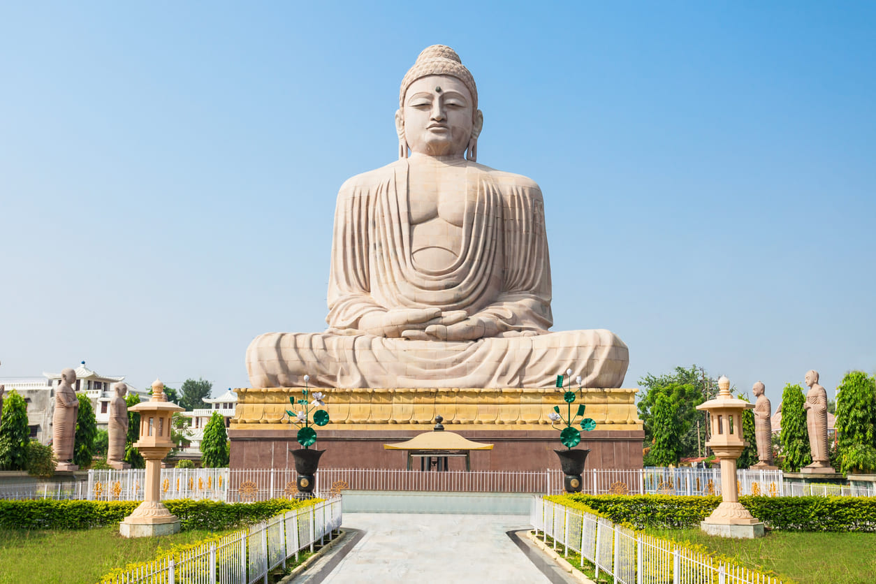 Majestic Great Buddha Statue in Bodh Gaya, symbolizing serenity and spiritual enlightenment.