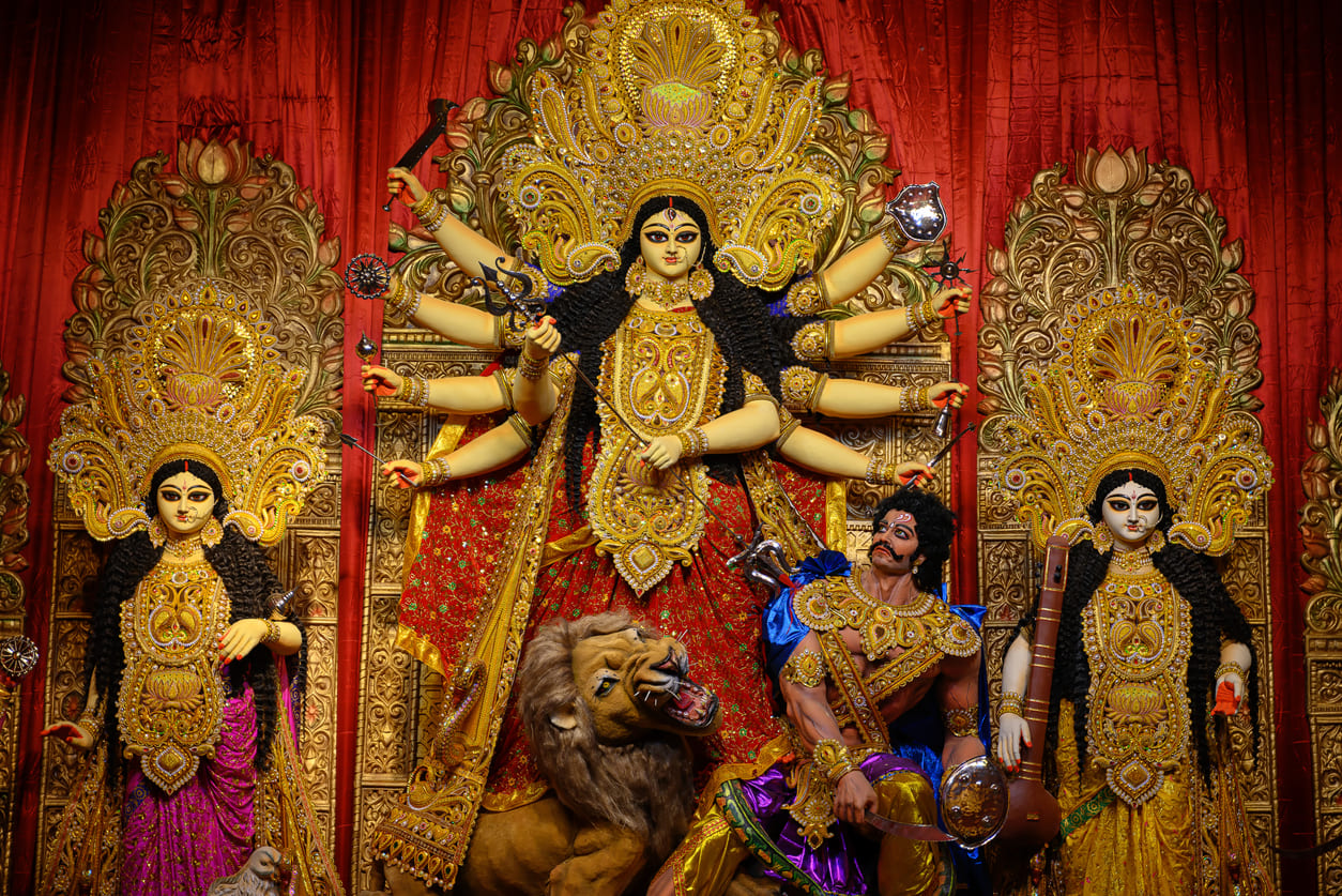 Grand idol of Goddess Durga slaying Mahishasura, symbolizing her divine victory celebrated on Maha Navami.