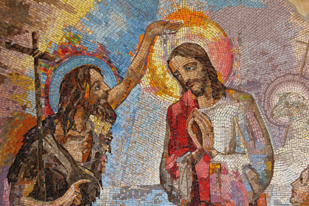 Mosaic depicting the Baptism of Jesus by St. John in the River Jordan, symbolizing a moment of divine revelation and the start of His ministry.