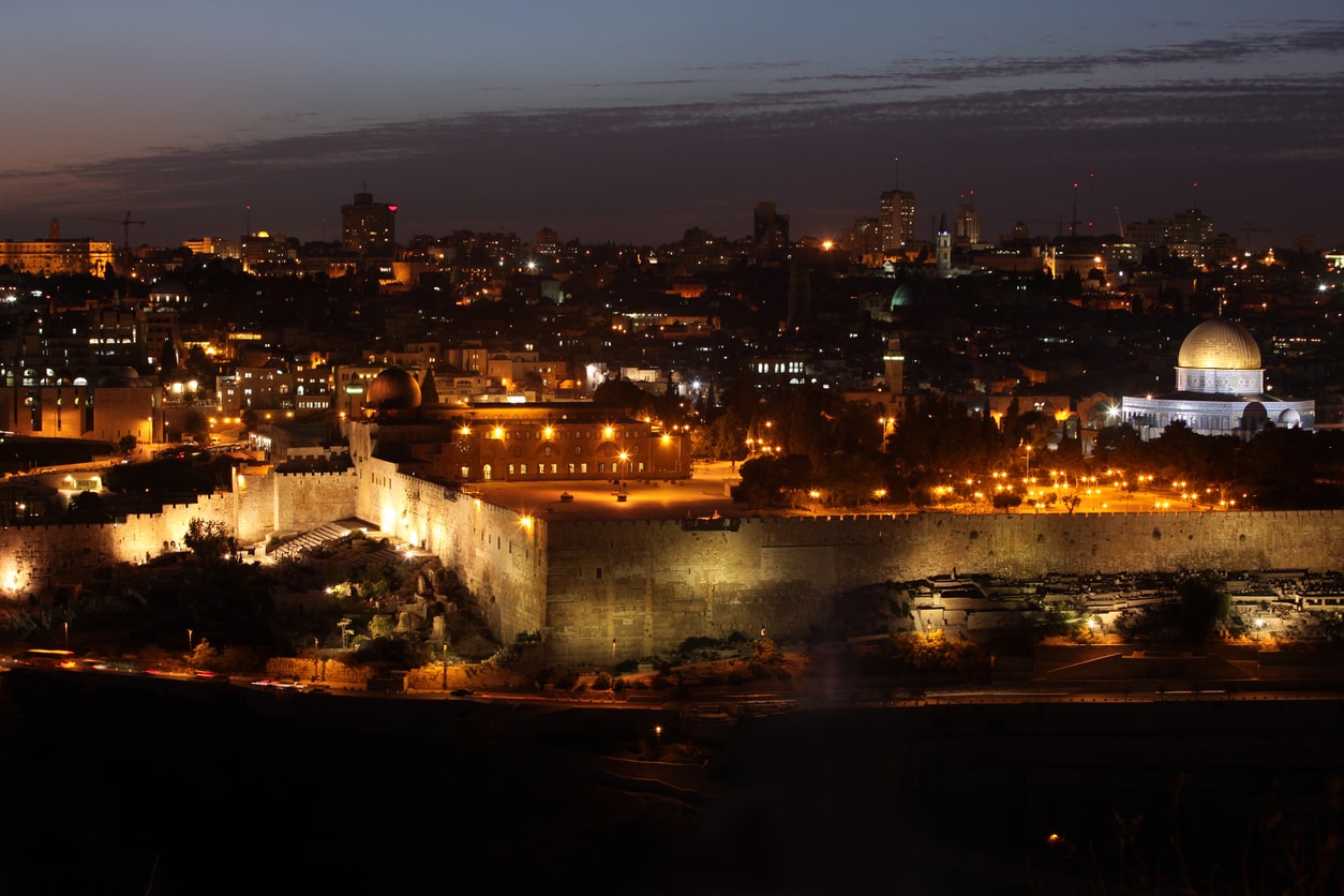 Al-Aqsa Mosque in Jerusalem illuminated at night stands as a symbol of spiritual significance and history