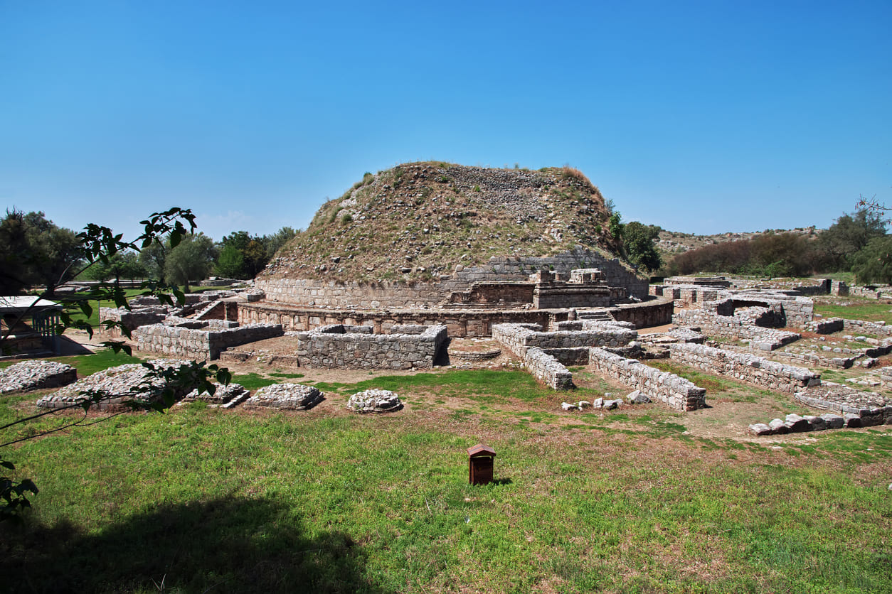 An ancient view of the Dharmarajika Stupa in Taxila, Pakistan, showcasing its historic and Buddhist significance.