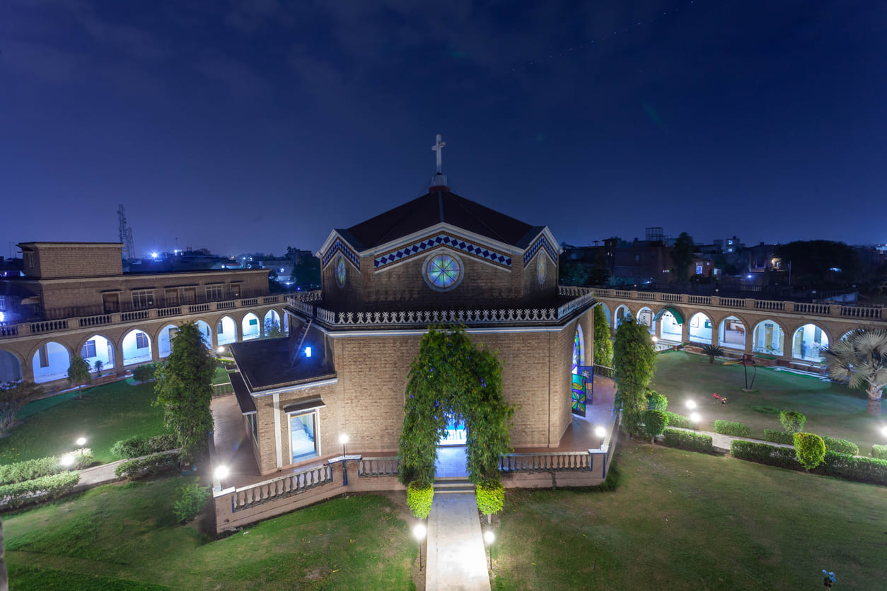 Renewal Center in Lahore, elegantly illuminated at night, symbolizing a place of peace and spiritual reflection for the Christian community.