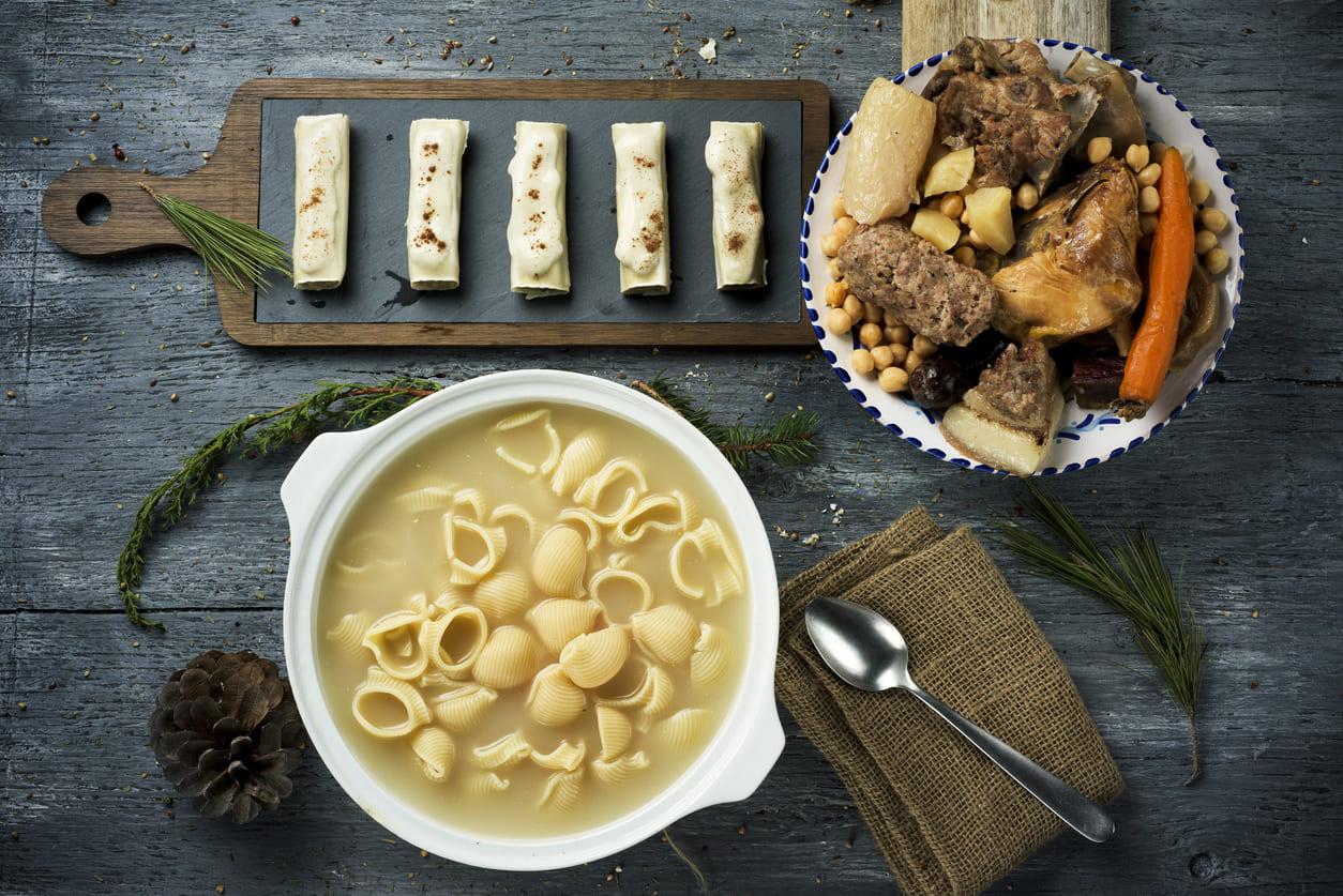 A traditional Catalan feast for Sant Esteve, featuring canelons and escudella i carn d'olla, symbolizing festive family traditions.