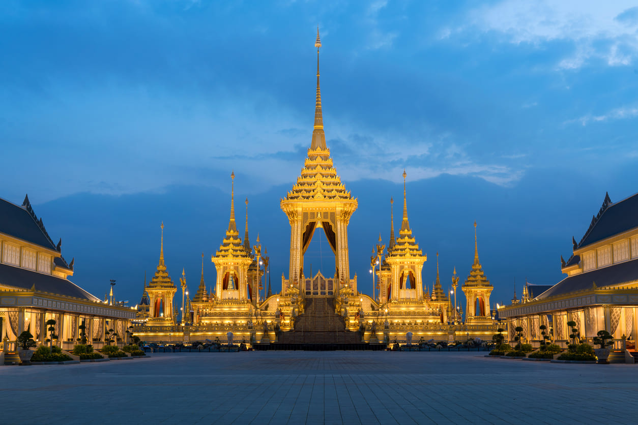 A beautifully illuminated Royal Crematorium at Sanam Luang, symbolizing the nation's profound respect and remembrance for King Bhumibol.