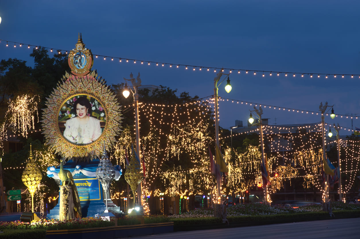 A beautifully decorated portrait of Queen Sirikit The Queen Mother surrounded by lights, reflecting the national celebrations on her Birthday and National Mother's Day.