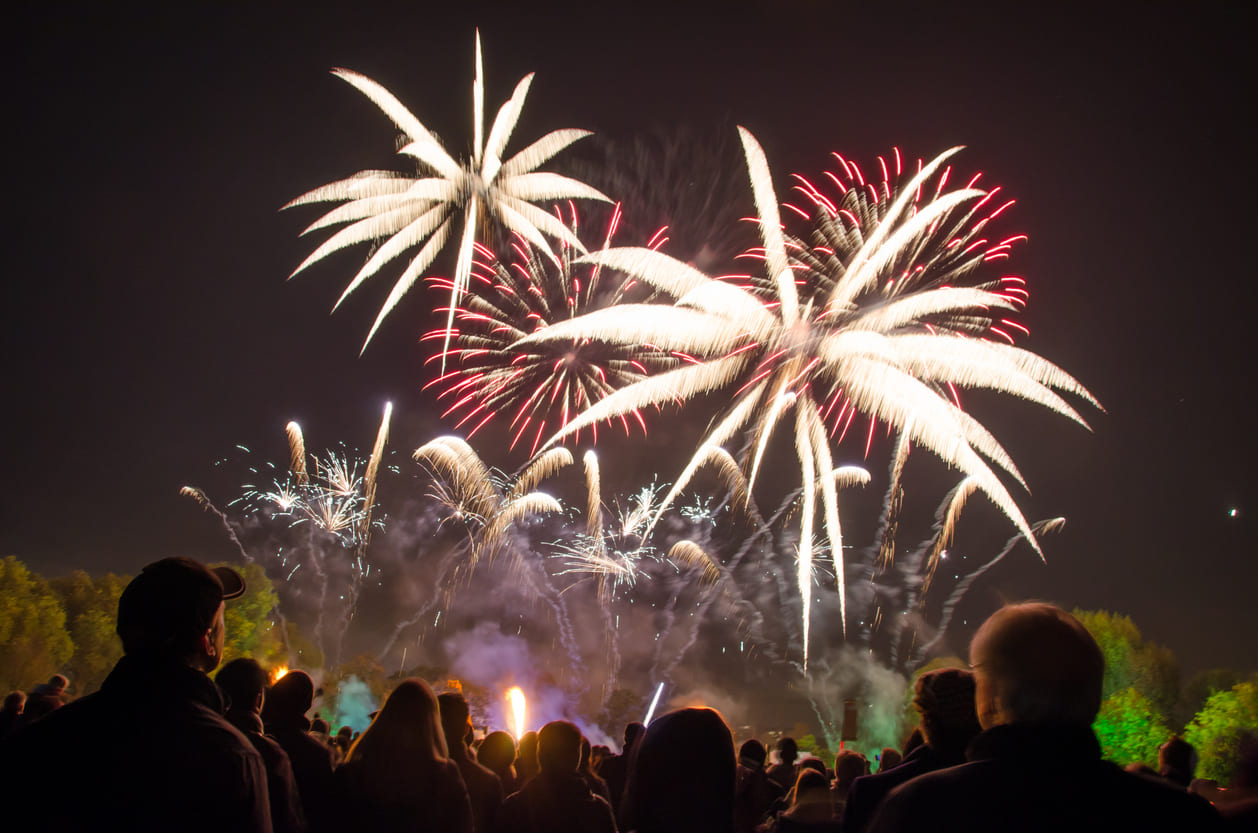 Fireworks light up the night sky as crowds gather to celebrate Guy Fawkes Day.