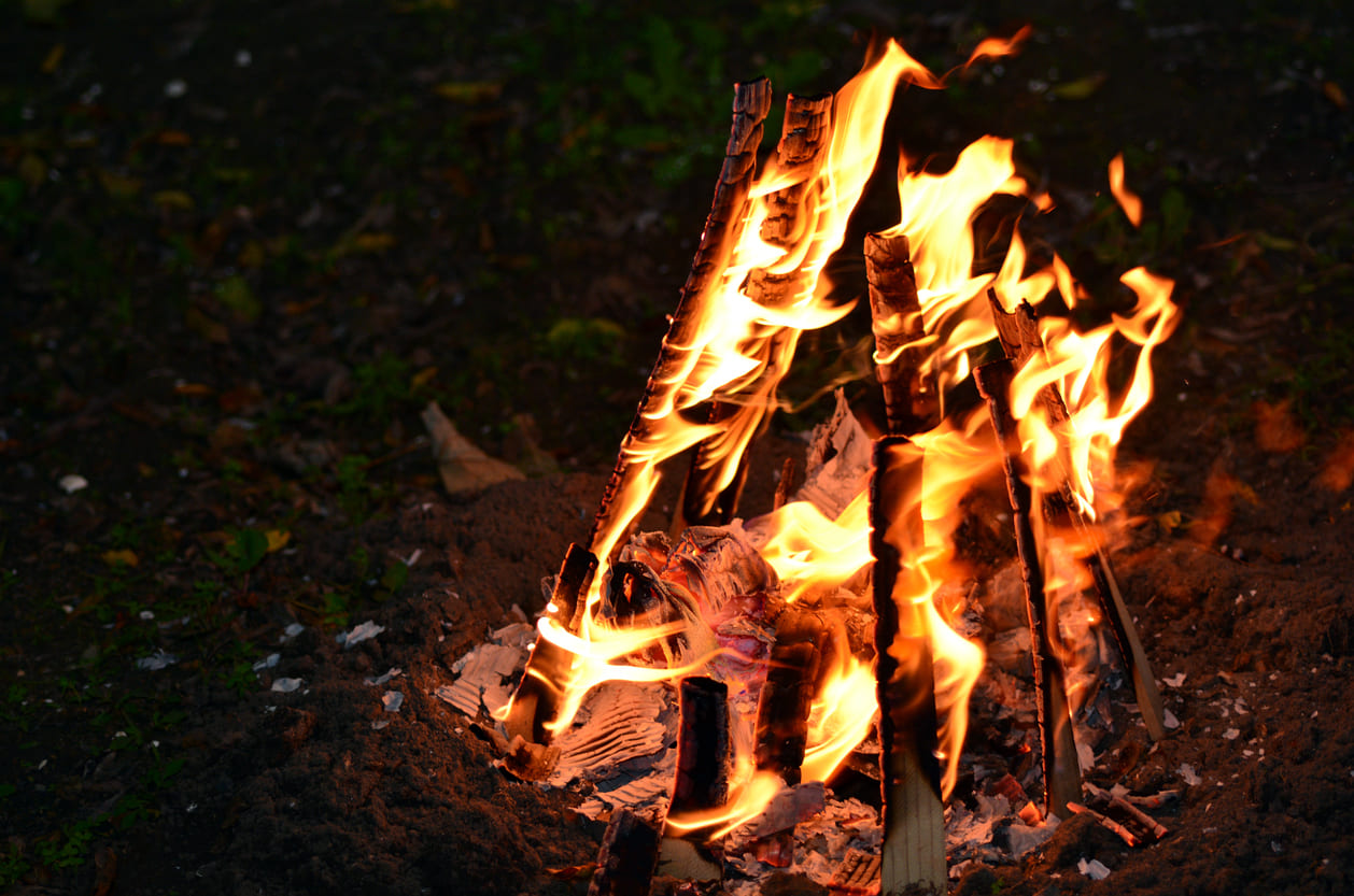 A vibrant bonfire burns, capturing the essence of Lag B'Omer festivities.