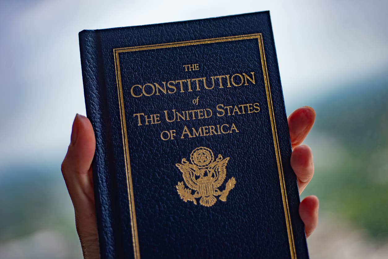 U.S. Constitution, symbolizing the principles of democracy and citizenship.