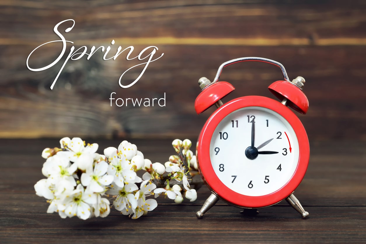 DST begins as the table clock springs forward, marking the transition to summer time.